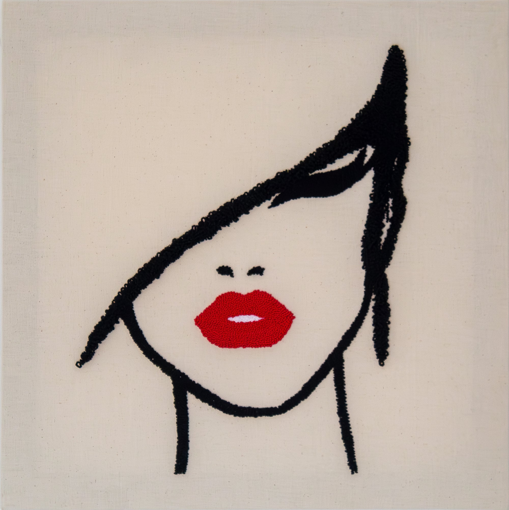 Silueta rostro bordado